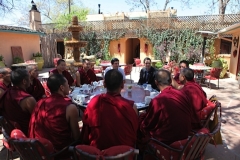 Tibetan Monks of Drepung Loseling Monastery (Mystical Arts of Tibet tour) offer blessing prayers for Inn of The Five Graces, it’s staff and many guests. With managing partner Sharif Seret.