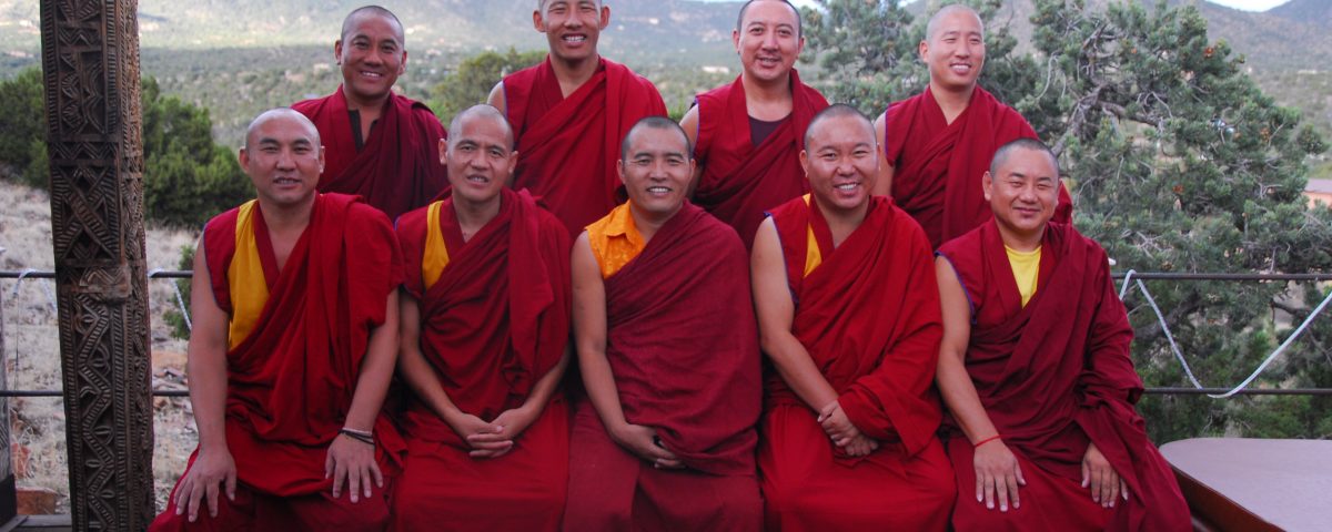 Monks from the Drepung Loseling Monastery pose for a photo in Santa Fe, NM